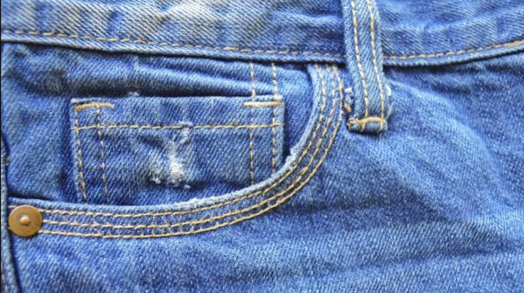 Wozu dient die winzige Vordertasche an Ihren Jeans?