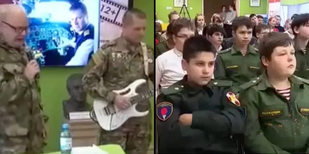 Desinteressierte russische Schulkinder müssen Soldaten beim Kriegslied Zuhören